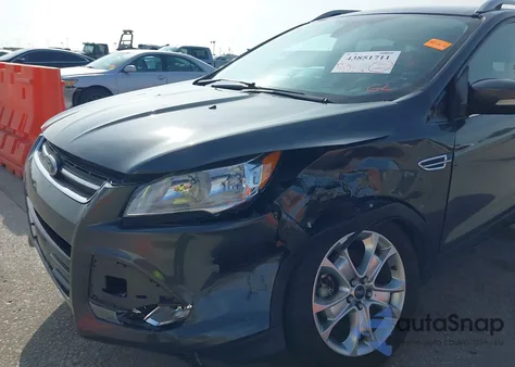 2015 Ford Escape Titanium from USA, damaged, VIN 1FMCU0J97FUA77640